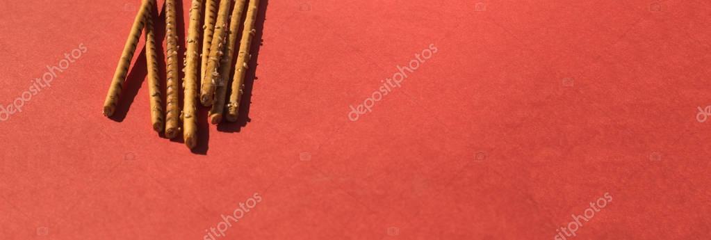 Salty sticks on red Stock Image