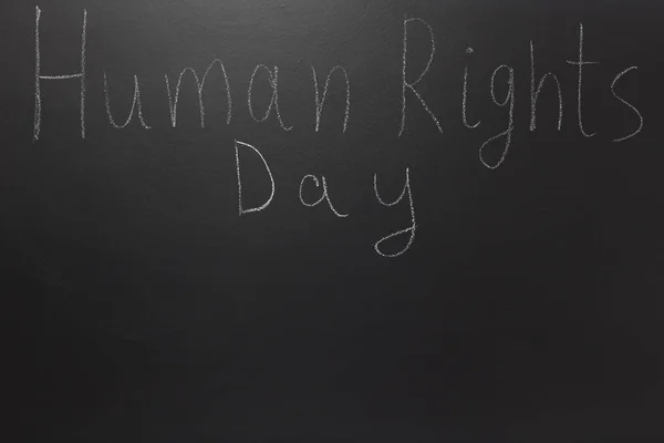 Human rights concept: The text: Human rights day written on blackboard. — Stock Photo, Image