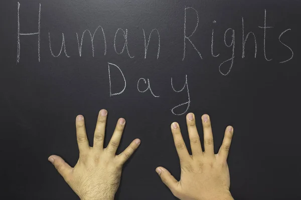 Human rights concept: The text: Human rights day written on blackboard. — Stock Photo, Image