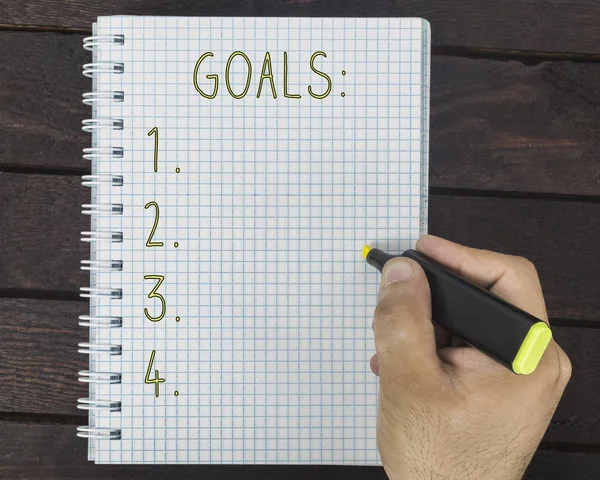 Erkek el bir not etmek üstünde gol yazma