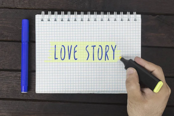 Escritura a mano en el bloc de notas: Historia de amor — Foto de Stock