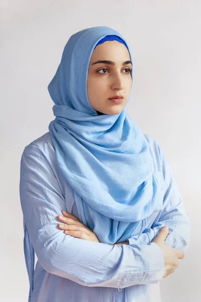 Beautiful Muslim woman in hijab against white background. Portrait of pretty middle-eastern female wearing traditional Islamic dress - abaya. Young girl in stylish Muslim clothing — 스톡 사진