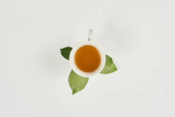 Cup Sweet Green Tea Leafs Pure White Background — Free Stock Photo