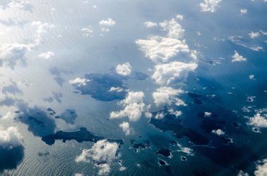 Aerial view of the Scilly Isles off the coast of Cornwall.  View looking south from St Martins towards St Mary's with the island of Tresco to the right hand side.  clipart