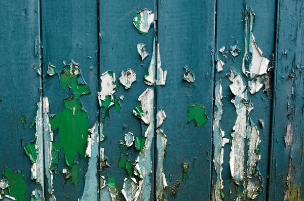 Festékhámlás Egy Fából Készült Ajtón Amely Zöld Kék Előző Árnyalatait — Stock Fotó