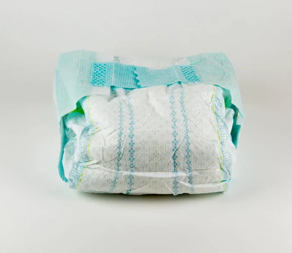 Full baby diaper on a white background — Stock Photo, Image