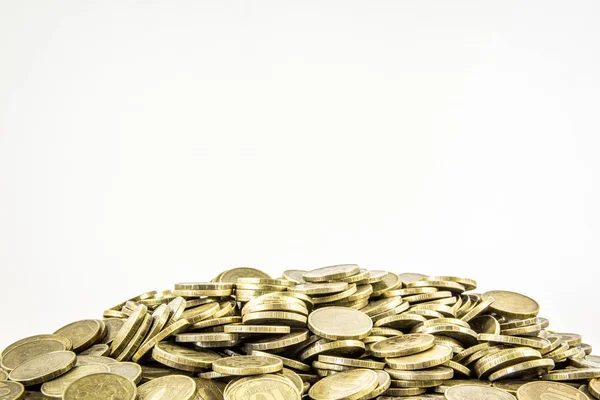 A lot of coins on a white background Royalty Free Stock Images