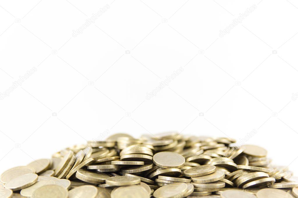 A lot of coins on a white background