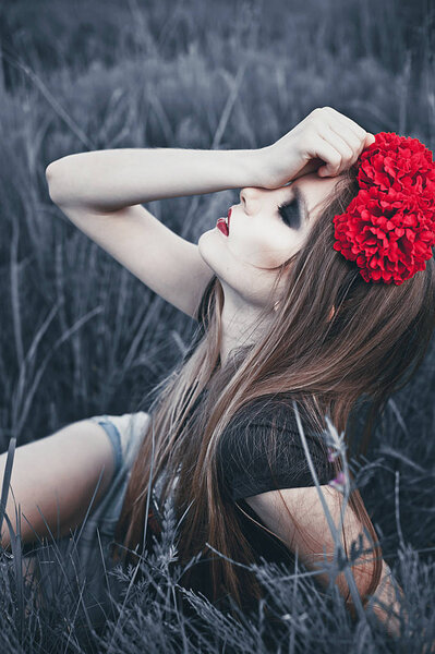 Portrait of Fashion Beautiful Woman on Nature. Pure Beauty Model Girl. Perfect bright smoky Makeup. With Flower Wreath. Cold toning. Punk, rock, gothic, fashion mood.