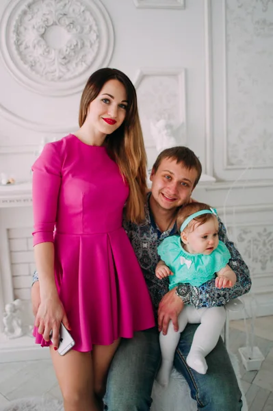 Beautiful family portrait spending time together at studio — Stock Photo, Image