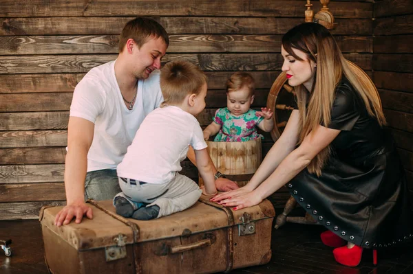 Beautiful family portrait spending time together at studio — Stock Photo, Image