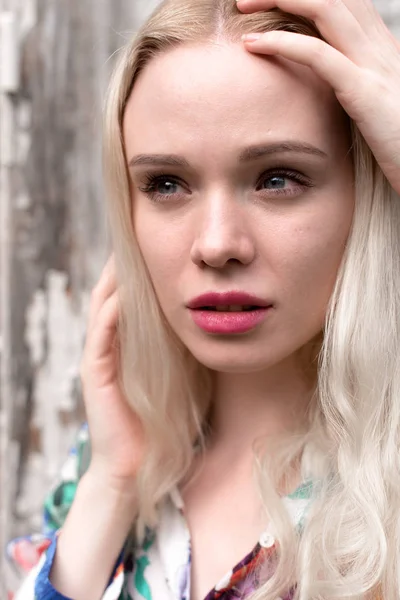 Young european blond woman outdoors portrait. Bright white colors. — Stock Photo, Image