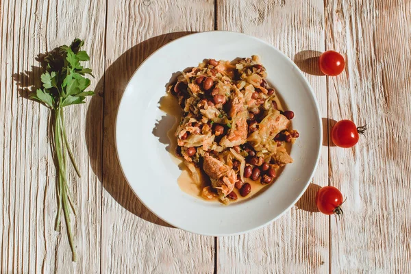 Chili Beans Stew with meat and cabbage, Bread, Red Chili Pepper And Garlic Ready To Be Served, concept of homemade healthy food