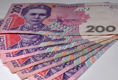 Işık arka planda Hryvnia notları