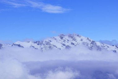 Impressive winter landscape with a mountain peak on a sunny day in La Tzoumaz, Riddes, Switzerland