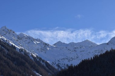 Impressive winter landscape with a mountain peak on a sunny day in La Tzoumaz, Riddes, Switzerland