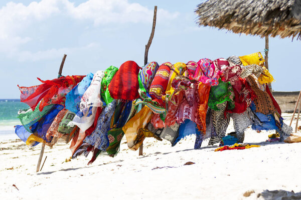 Multicolored textiles on the beach