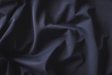 Katlanmış koyu mavi yün kumaş arka plan için tekstili kapat. 