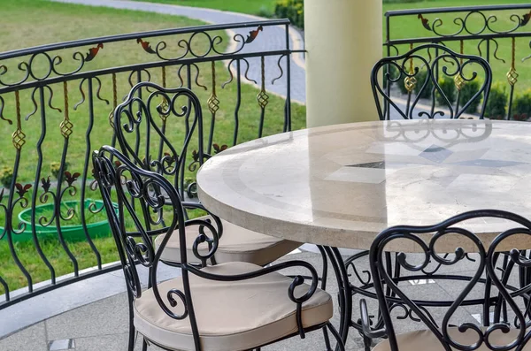 Forged elements of garden furniture outdoors