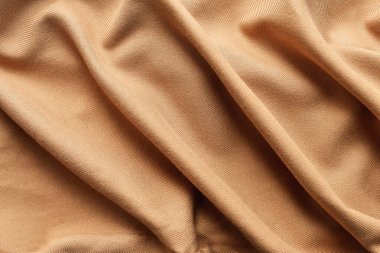 Arkaplan için bej veya açık kahverengi kumaş