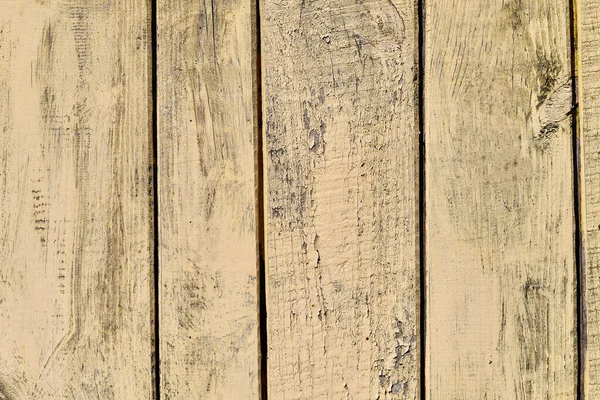 Light yellow weathered wooden planks background