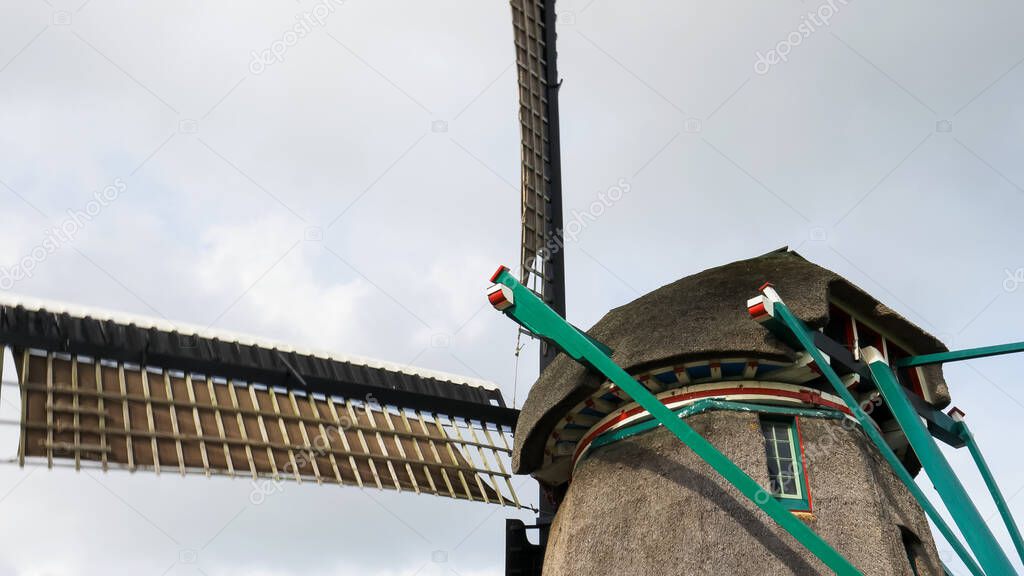 close up of a windmill at zaanse schans near amsterdam