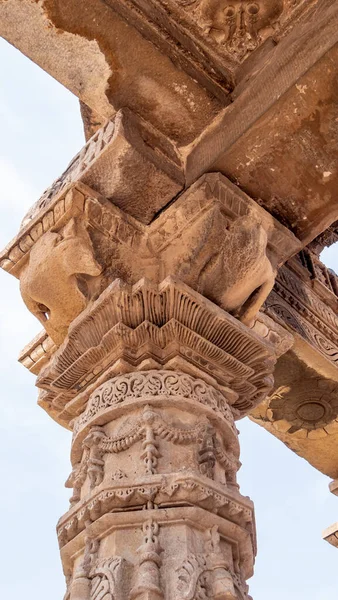 top of a column at qutub minar complex ruins in delhi