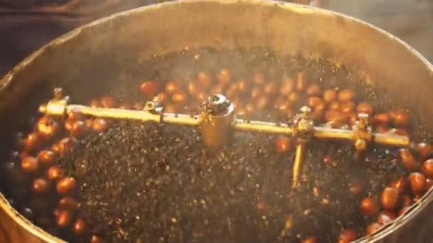 Close up of chestnuts roasting in a drum at chinatown in kuala lumpur — Stock Video