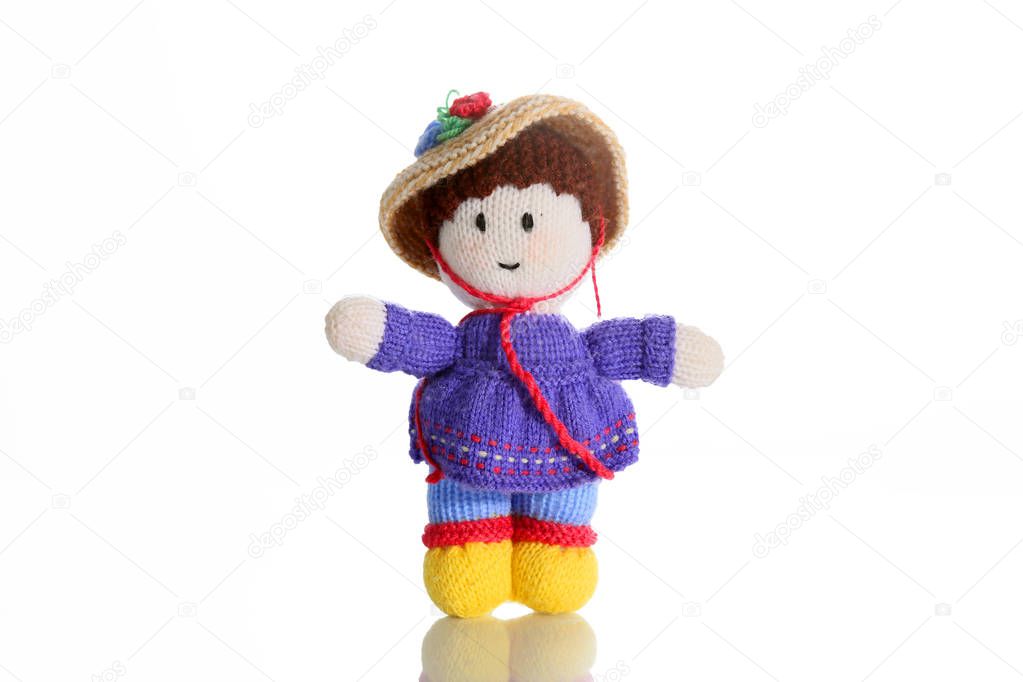 Lady with wool as a toy for child .
