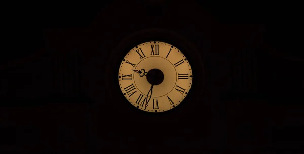 Old illuminated clock — Stock Photo, Image