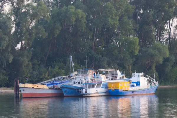 Industrial ships in a small harbour — Stock Photo, Image