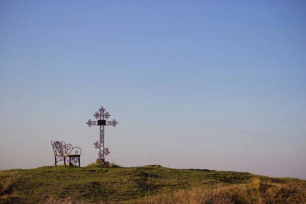 Cruz de cementerio en silueta —  Fotos de Stock