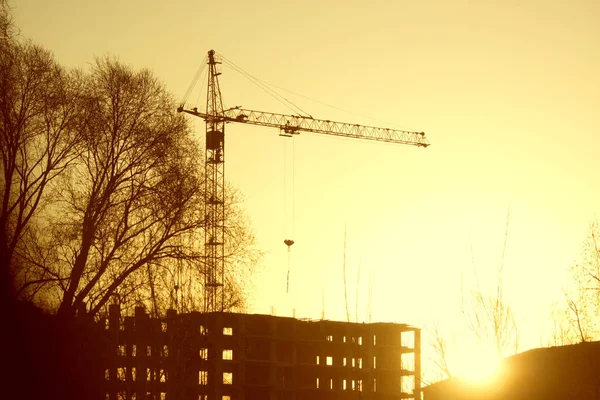 Silhouet van bouw site kraan — Stockfoto