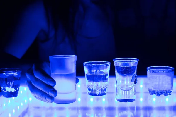 Woman in a bar or club — Stock Photo, Image