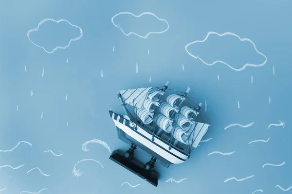 ship model in a storm