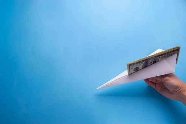Kağıt uçağı Doları banknot ile