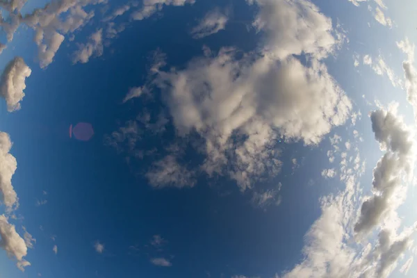 White clouds on the blue sky