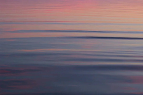 Захід сонця над водою — стокове фото