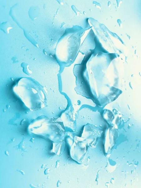 Lód Topnieje Niebieskim Tle Tło Lodu — Zdjęcie stockowe