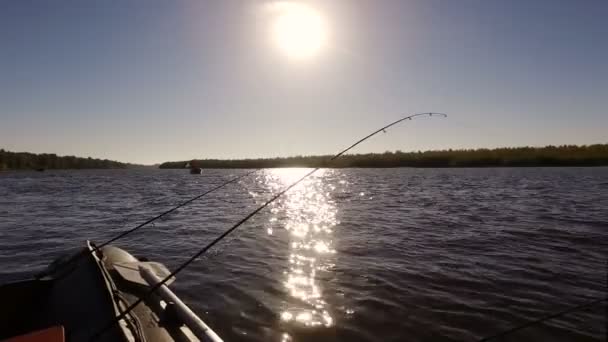 Scenic landscape. Fishing rods and other tackle on a motor rubber boat. 4K — Stock Footage Scenic landscape. Fishing rods and other tackle on a motor rubber boat. 4K Royalty Free Stock Video