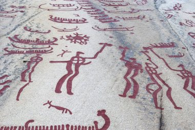 Historic rock carvings in Tanum Sweden clipart