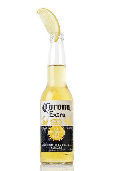 MINSK, BELARUS - JULY 10, 2017: Editorial photo of bottle of Corona Extra beer isolated on white, one of the top-selling beers worldwide is a pale lager produced by Cerveceria Modelo in Mexico — Stock Photo, Image