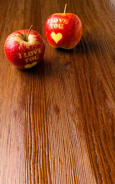 hearts apple i love you in wood background