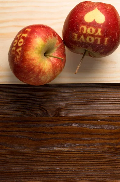 hearts apple i love you in wood background