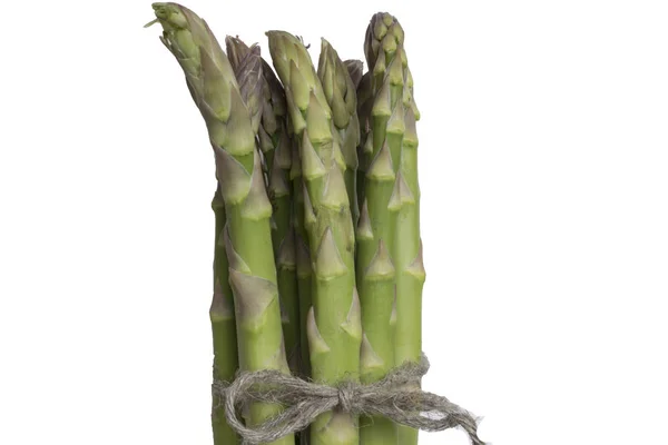 Raw green asparagus isolated on the wood background — Stock Photo, Image
