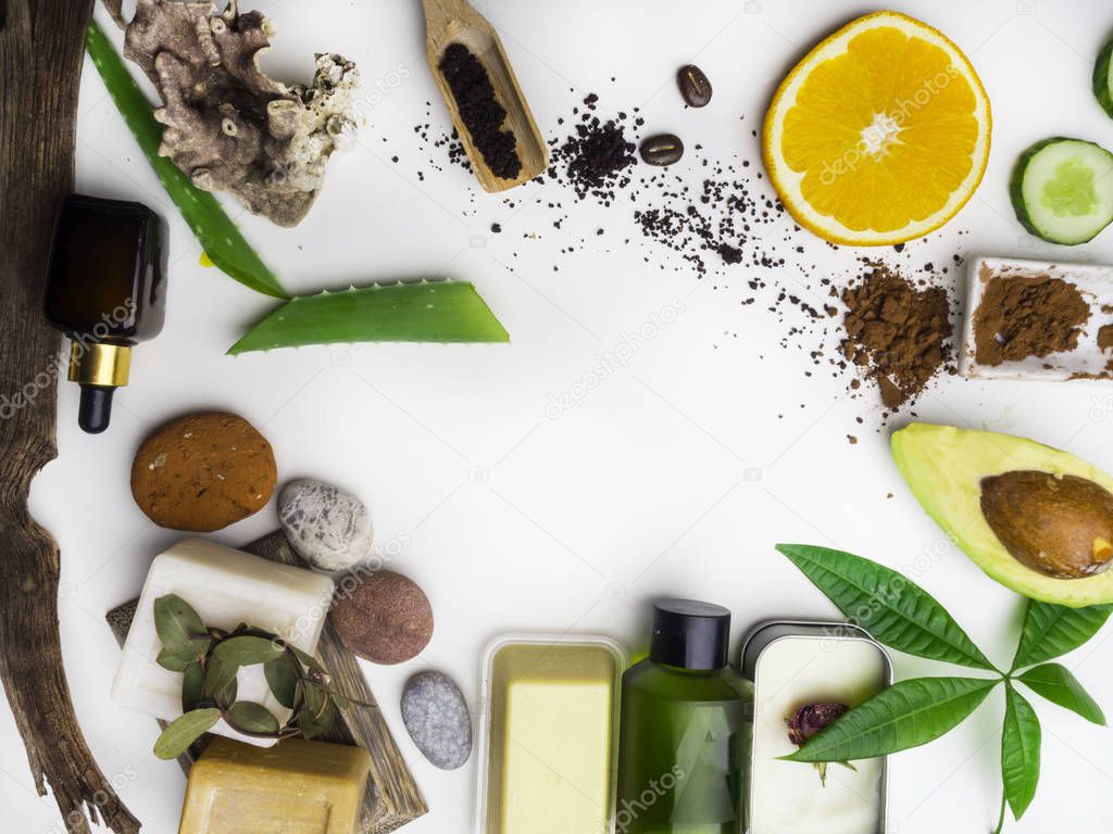 Natural eco skin care products, top view ingredients. Cosmetic, soap, leaf, aloe vera, avocado, serum, hyaluronic acid. Facial treatment preparation background.