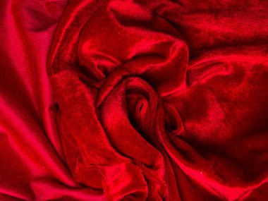 Shiny red velvet texture for background, red rose shape,, love and passion concept