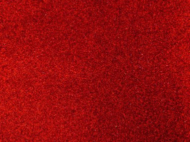 red background for a festive decoration, red glitter texture for festive poster, love concept for valentines day with sweet and romantic moment, christmas, weeding postcard
