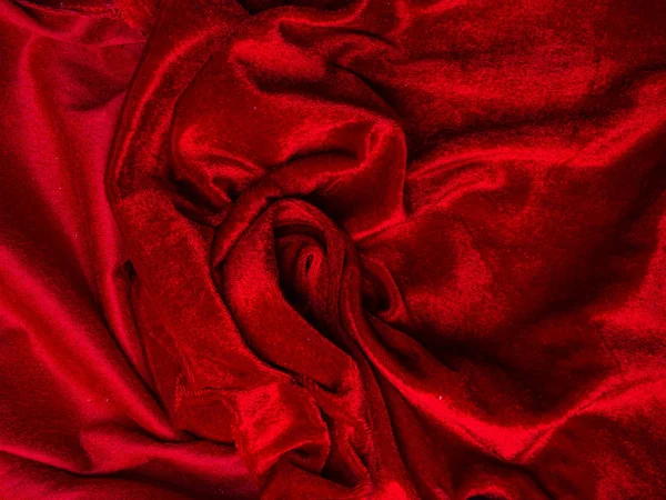 Βαθιά κόκκινη βελούδινη υφή για φόντο, σχήμα κόκκινου τριαντάφυλλου, αγάπη και πάθος. πολύ στοργικός και παθιασμένος. Μαλακό ύφασμα σε σχήμα γυναικείων γεννητικών οργάνων, χείλη — Φωτογραφία Αρχείου