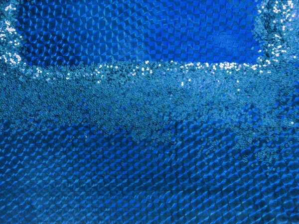Świąteczny abstrakcyjny brokat błyszczące niebieskie tło, koncepcja wakacje. Modny kolor roku 2020 — Zdjęcie stockowe